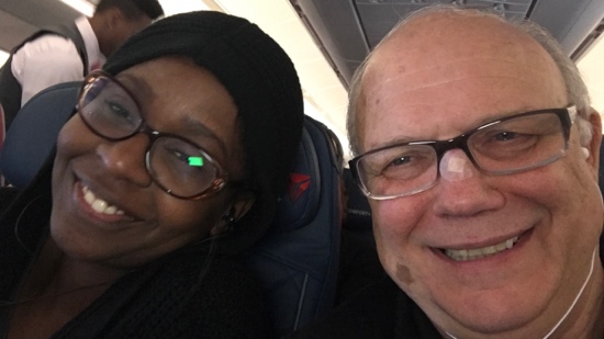 A person and person taking a selfie