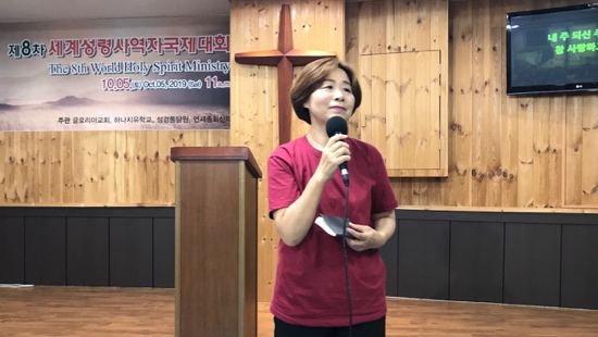 A person holding a microphone