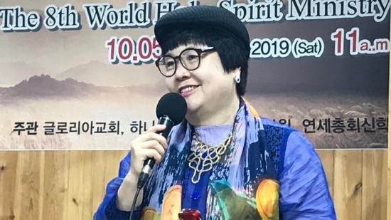 A person holding a microphone