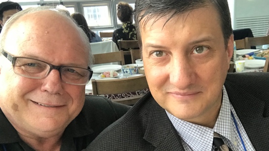Two men taking a selfie
