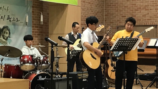 A group of people playing instruments