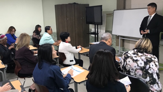 A group of people in a classroom