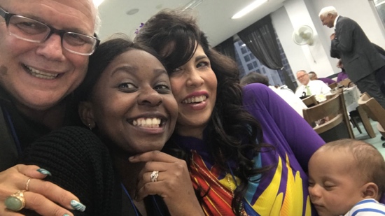 A group of women smiling for a selfie