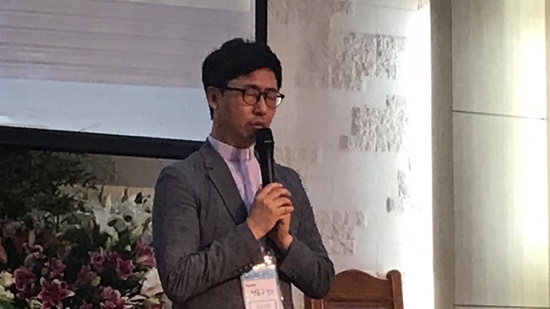 A person holding a microphone