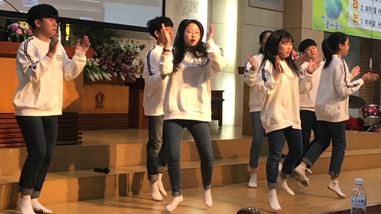 A group of people on a stage