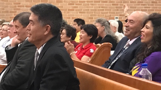 A group of people sitting in pews