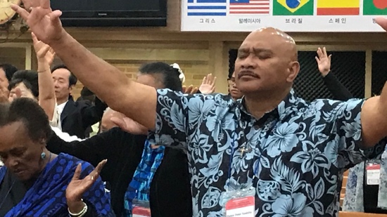 A person with his hand raised