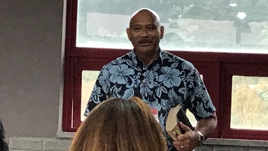 A person in a hawaiian shirt