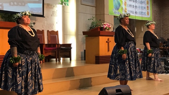 A group of women on stage