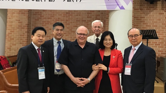 A group of people posing for a photo