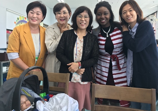 A group of women standing together
