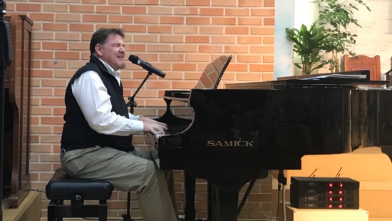 A person playing a piano