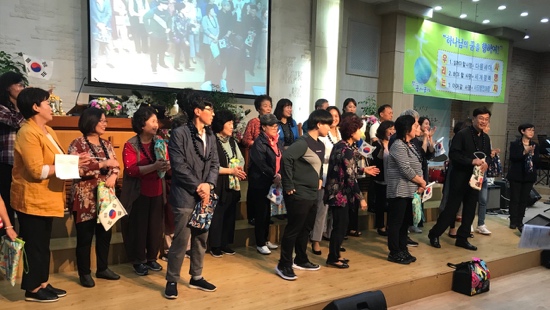 A group of people standing in a line