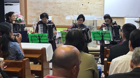 A group of people playing an instrument
