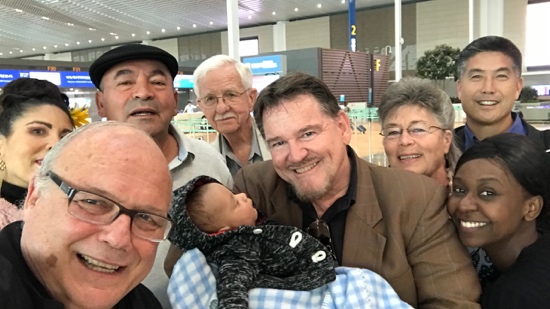 A group of people posing for a photo