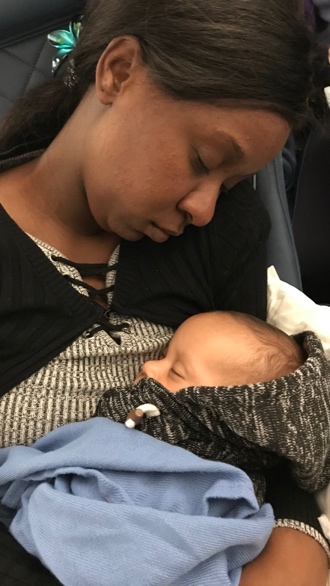 A person holding a baby