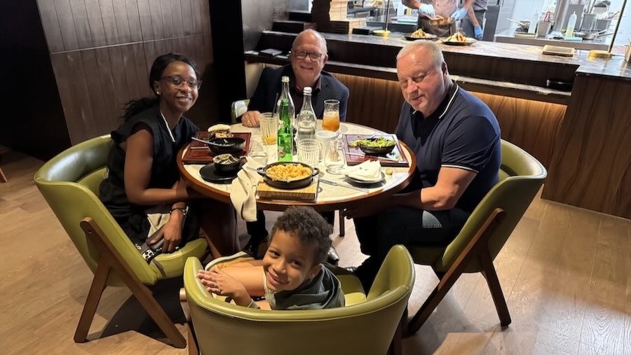 A group of people sitting at a table