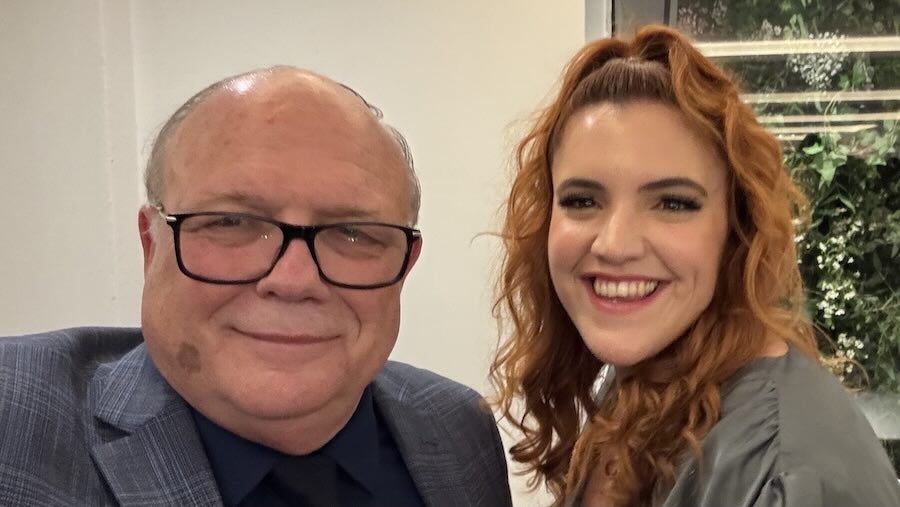 A person and person smiling for the camera
