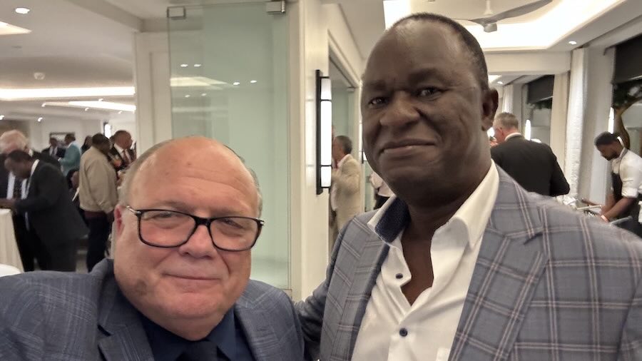 Two men posing for a picture