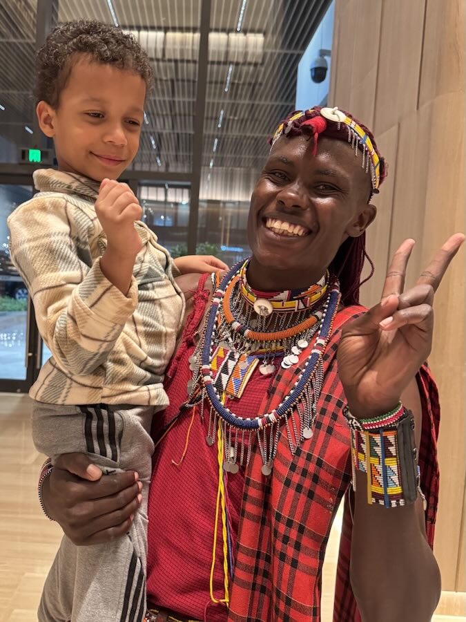A person holding a child