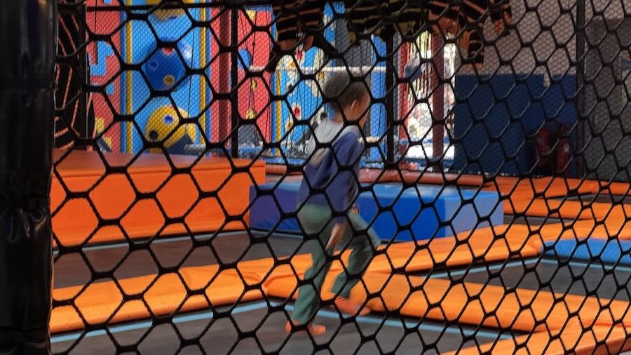 A child running on a trampoline