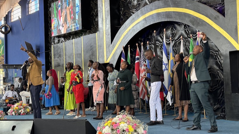A group of people standing on a stage