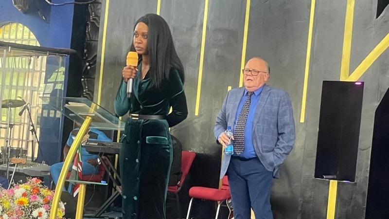 A person standing in front of a person