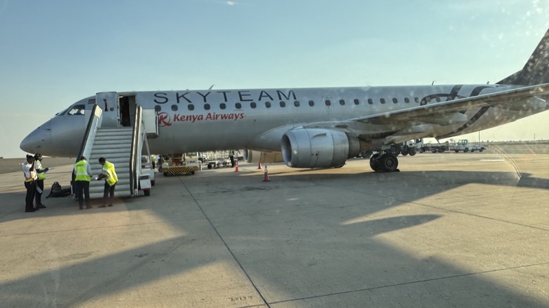 A plane parked at an airport