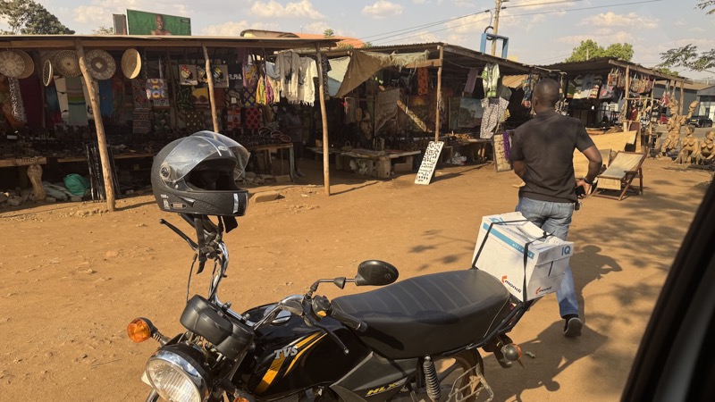 A person sitting on a motorcycle