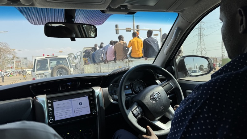 A person driving a car