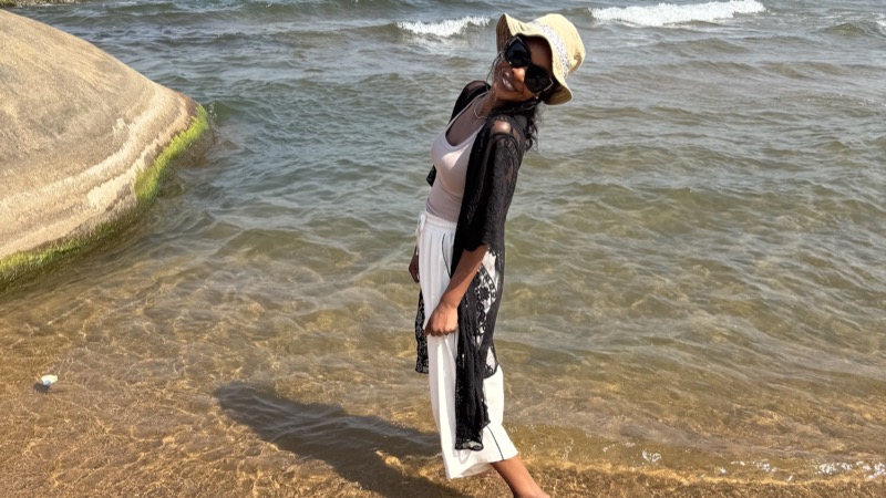 A person standing on the beach