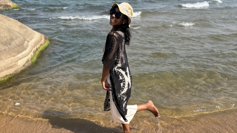 A person standing on a beach