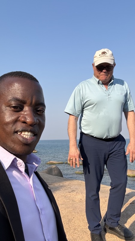 A person standing next to another person