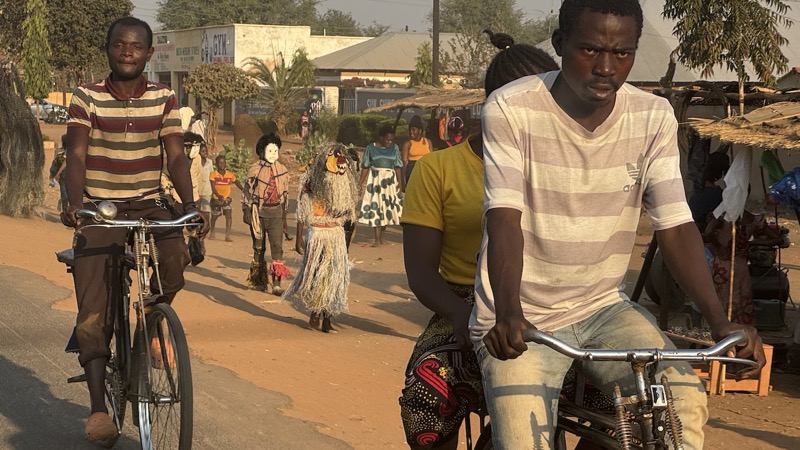 A group of people riding bicycles