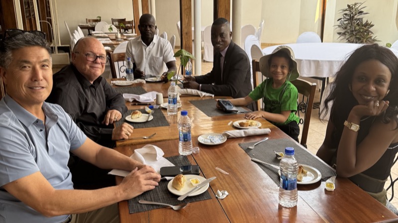 A group of people sitting at a table