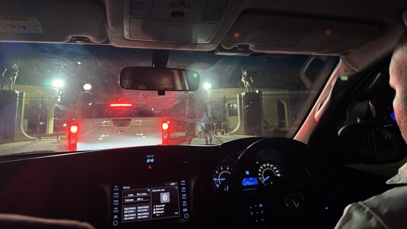 Inside a car driving at night