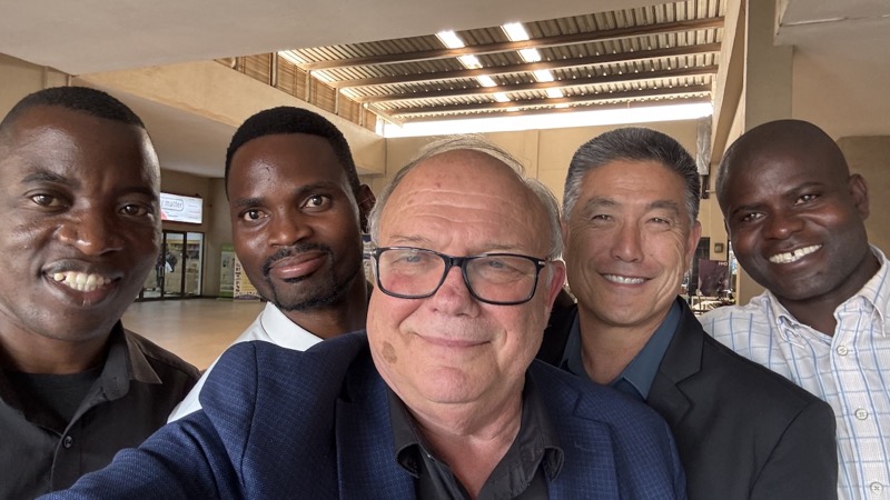 A group of men taking a selfie