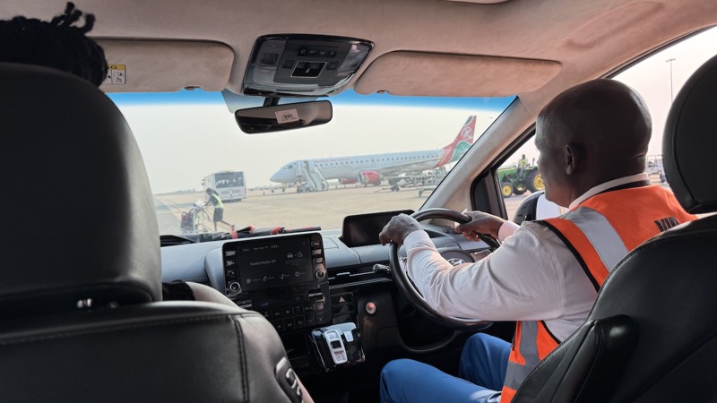 A person driving a car