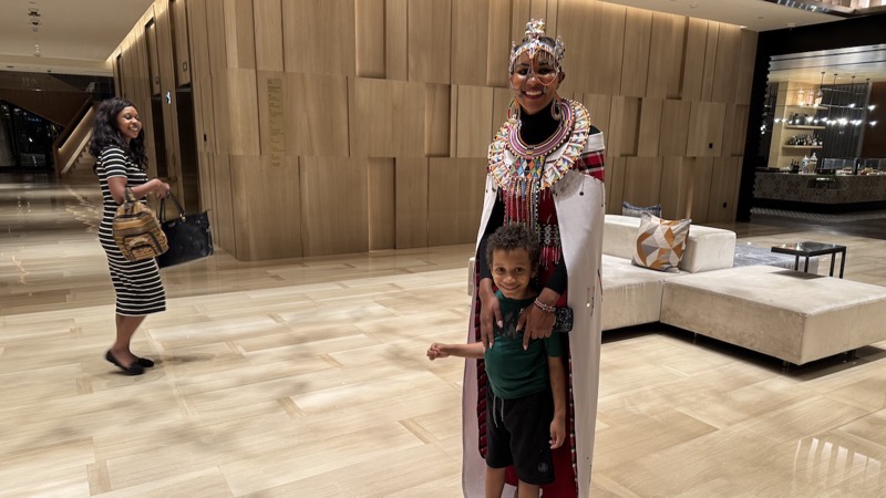 A person and child in a room