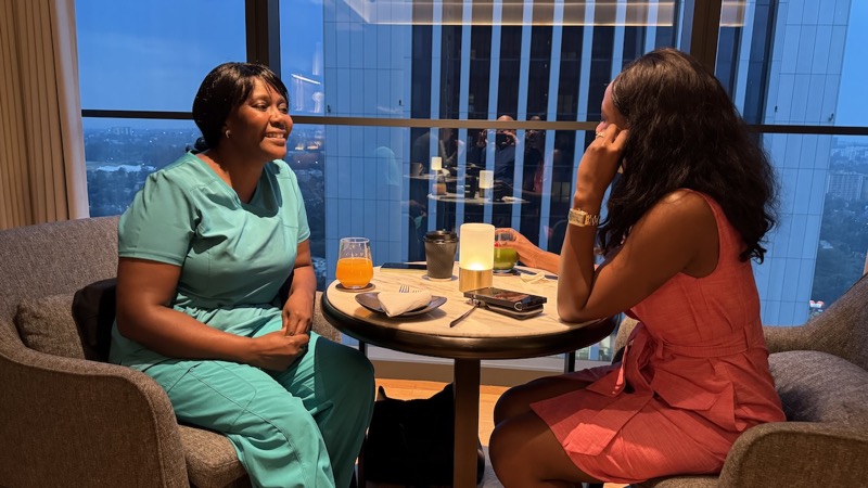 Two women sitting at a table