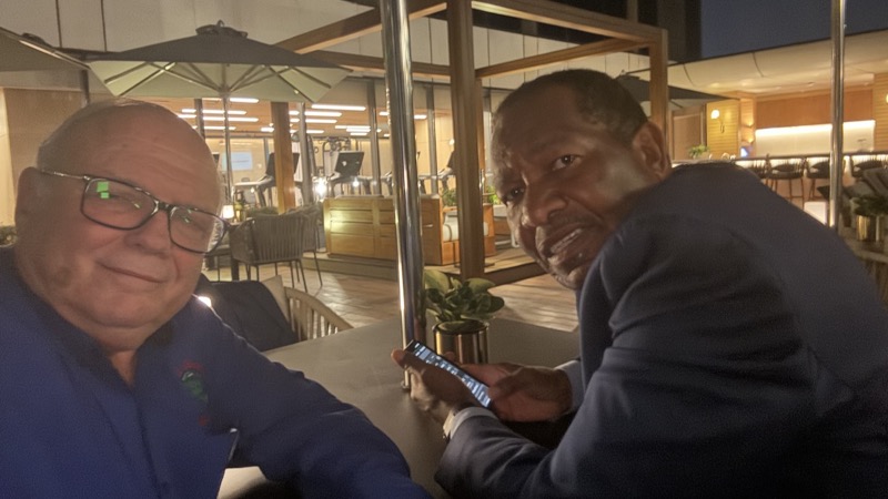 Two men sitting at a table