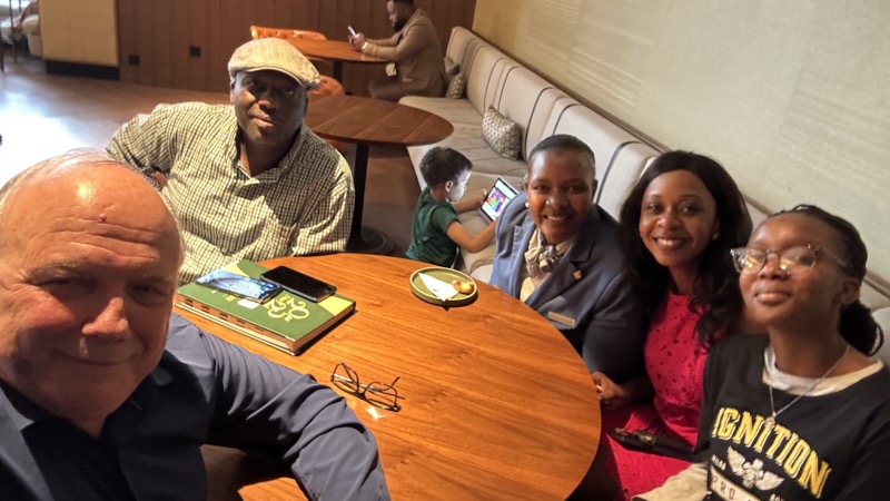 A group of people sitting at a table