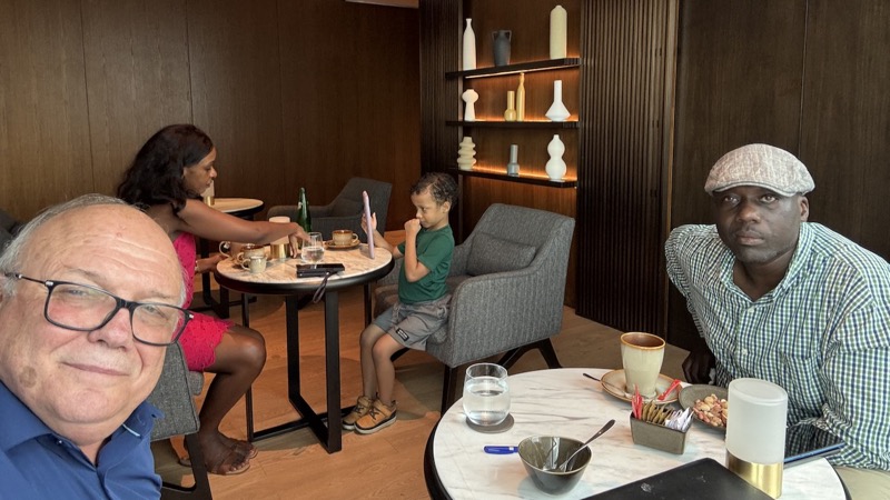A person and a child sitting at a table