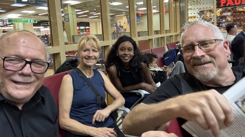A group of people sitting in chairs