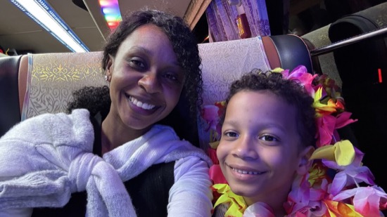A person and a child taking a selfie