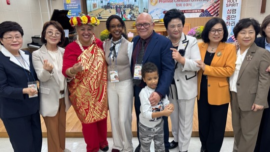 A group of people posing for a photo