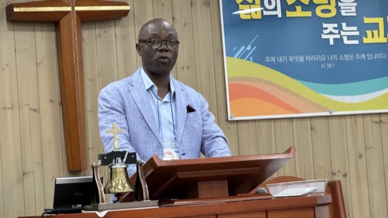 A person standing at a podium