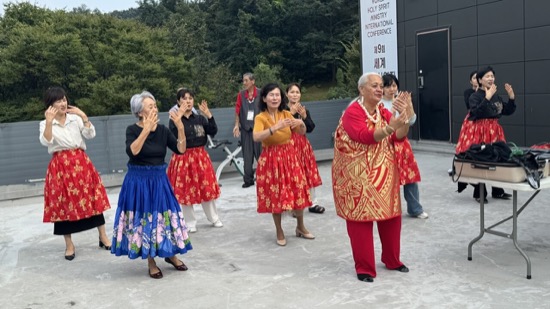 A group of people clapping