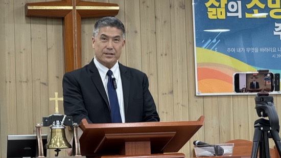 A person standing at a podium