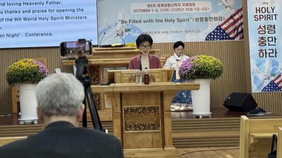 A group of people sitting at a podium